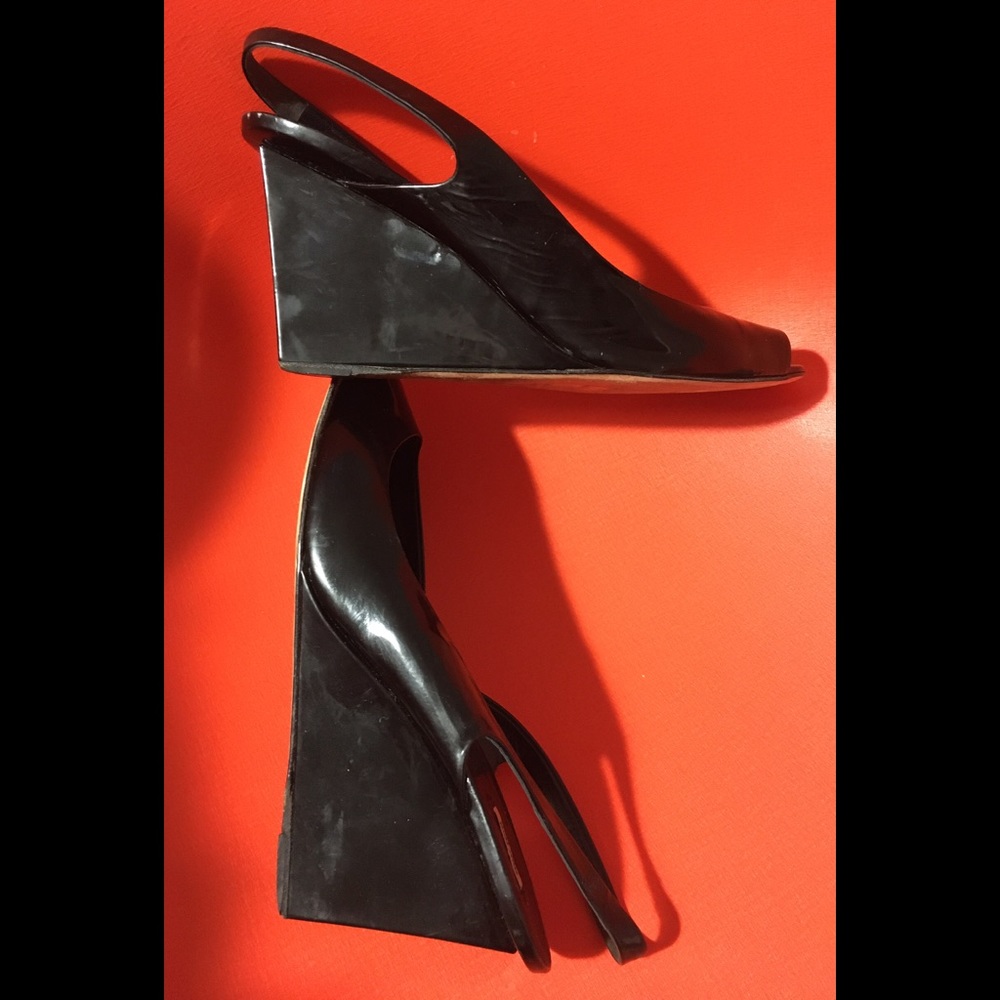 Miu Miu sling-back wedge with the twist